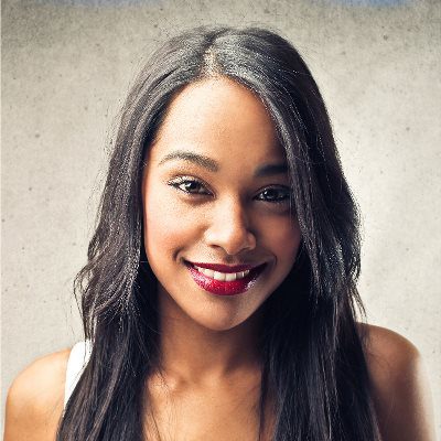 A woman with long hair and red lipstick.