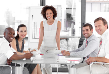 A group of people sitting at a table